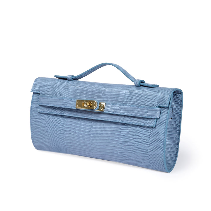 Jade Tejus clutch in leather featuring a secure closure, a retractable handle, and a detachable, adjustable shoulder strap.
