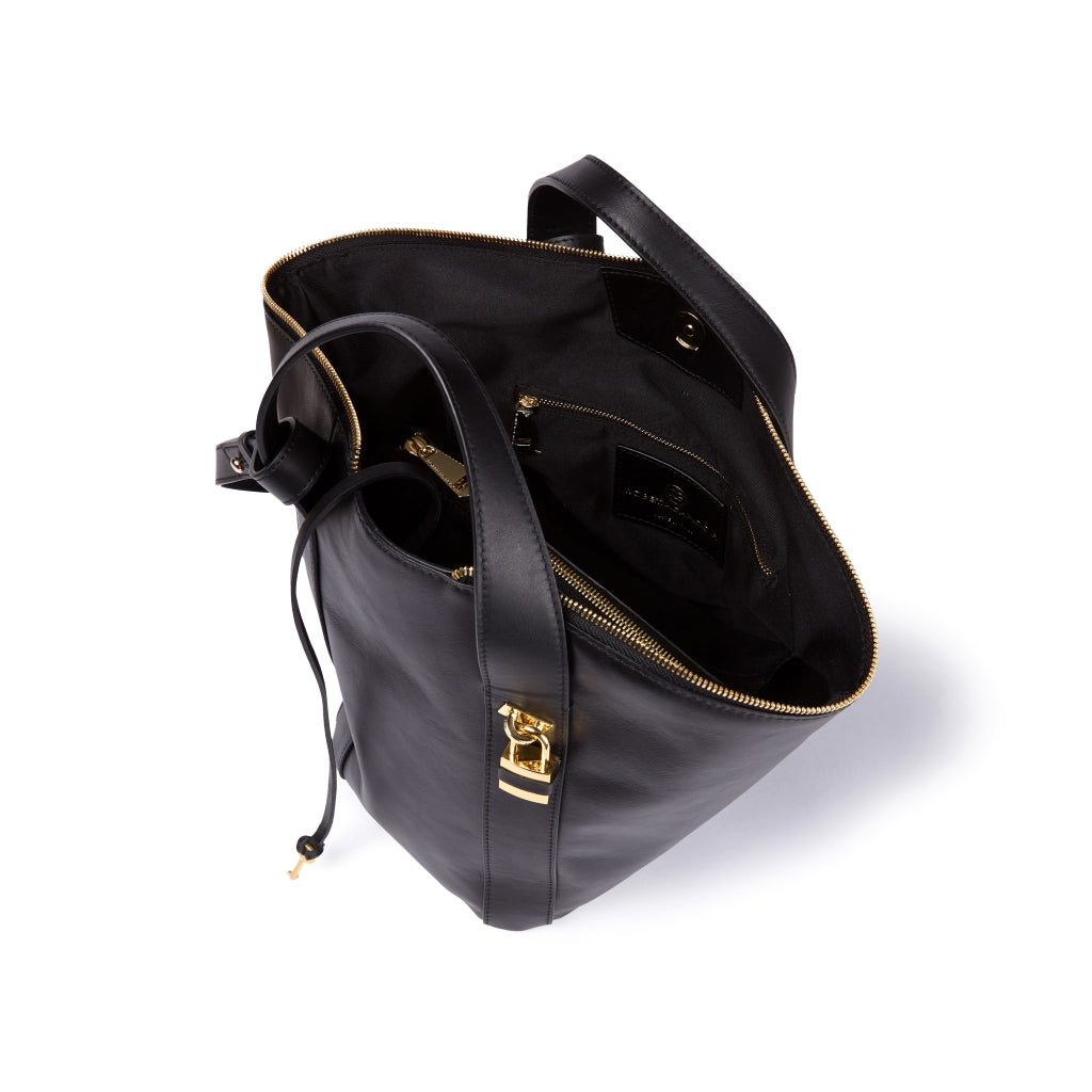 Amina small leather handbag with wrapped tubular handle and detachable shoulder strap