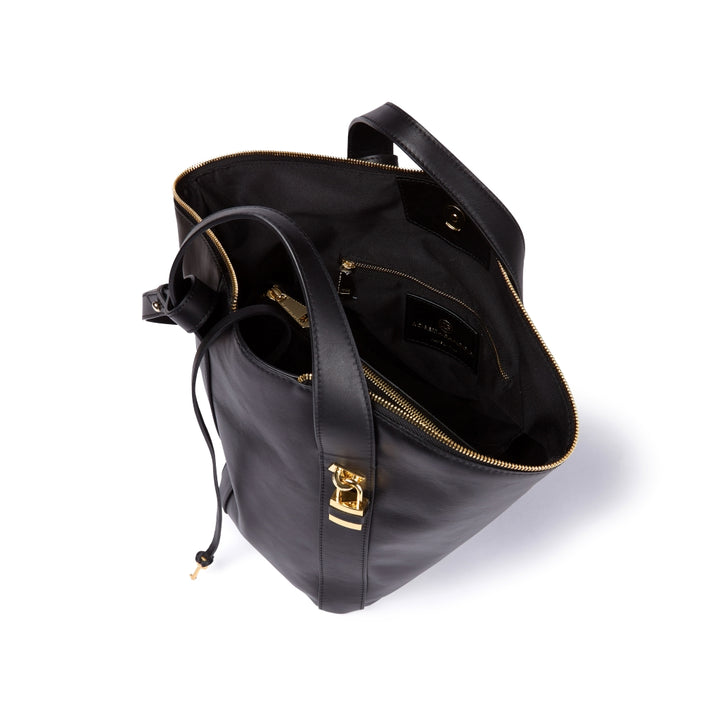 Amina small leather handbag with wrapped tubular handle and detachable shoulder strap