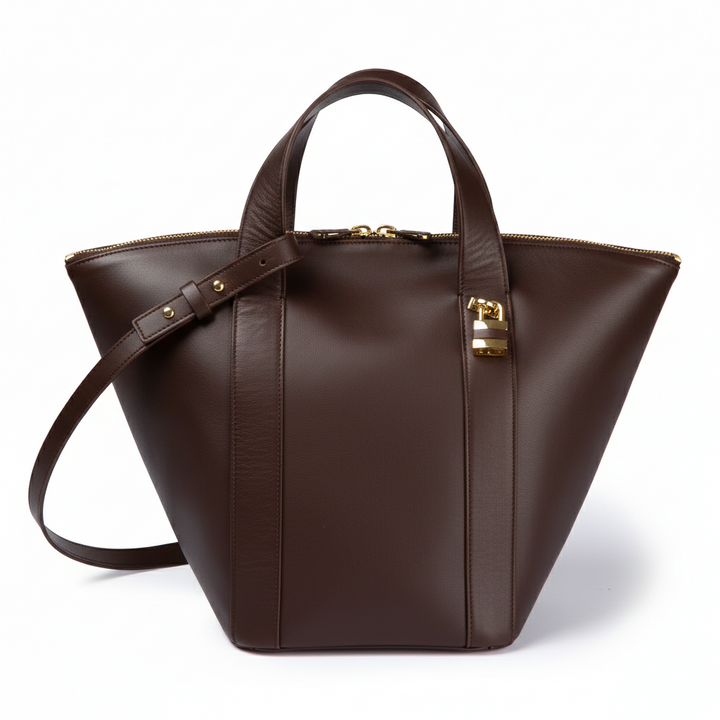 Amina small leather handbag with wrapped tubular handle and detachable shoulder strap