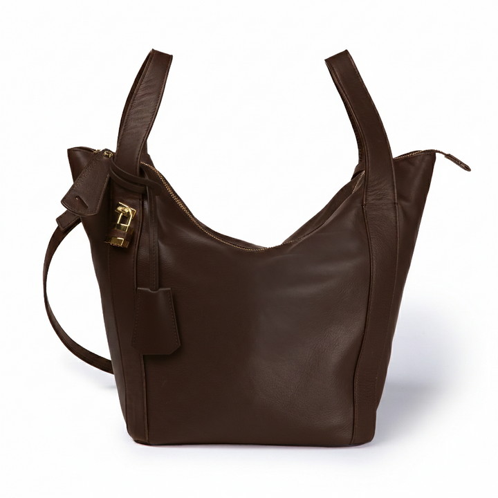 Amina small leather handbag with wrapped tubular handle and detachable shoulder strap