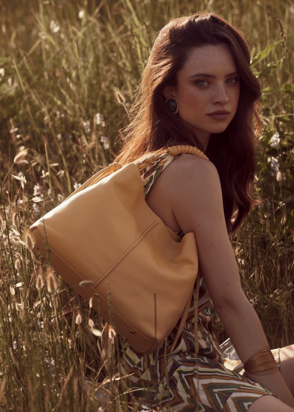 Amina large leather handbag with wrapped tubular handle and detachable shoulder strap
