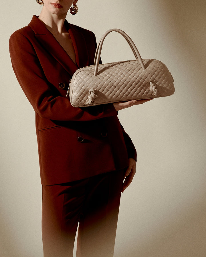 Grace Woven – Borsa Allungata in Pelle Effetto Intrecciato Argento