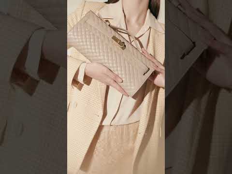 Jade Woven cluch borsa in pelle con chiusura  manico retrattile e tracolla staccabile e regolabile